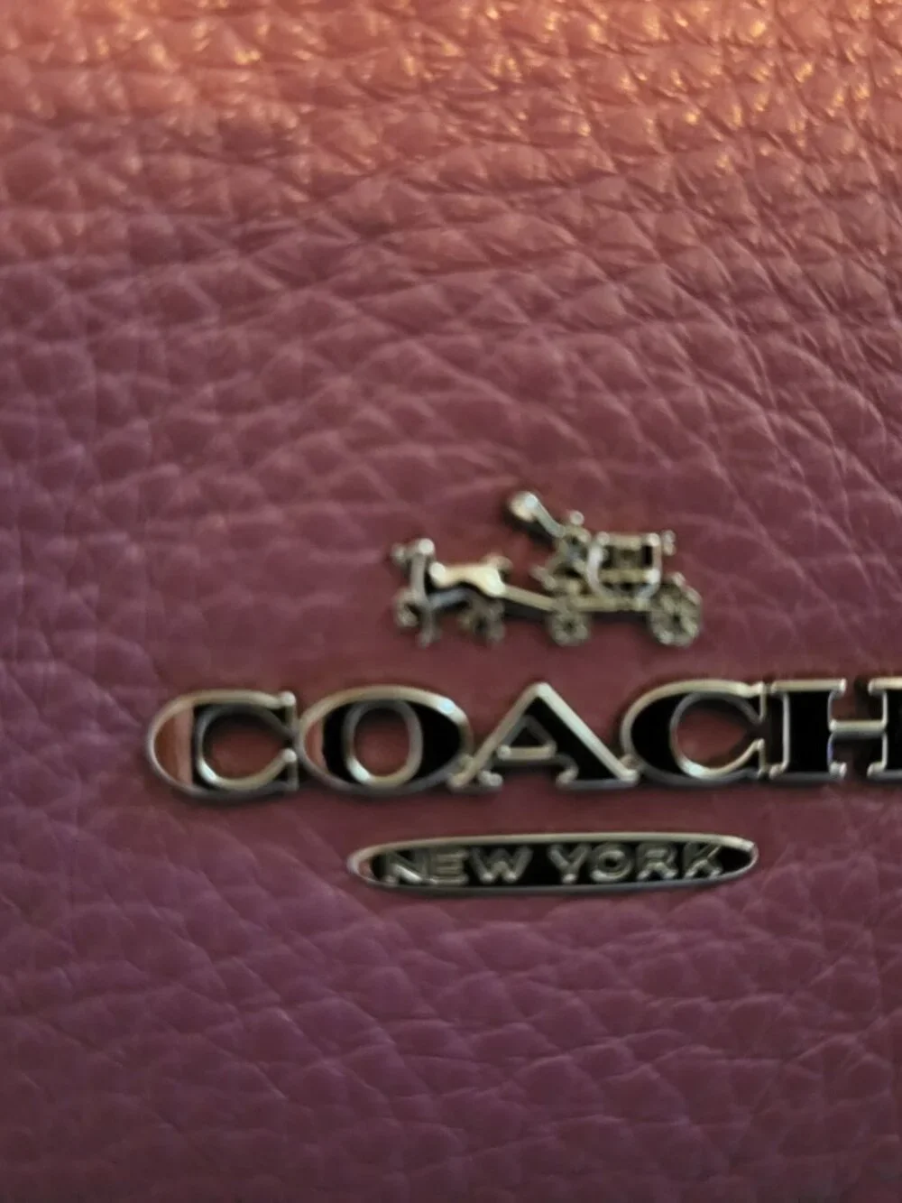 Coach color mauve bag